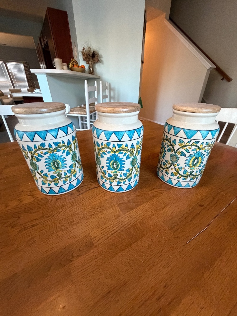 Set of 3 World Market hand painted Canisters with wooden lids